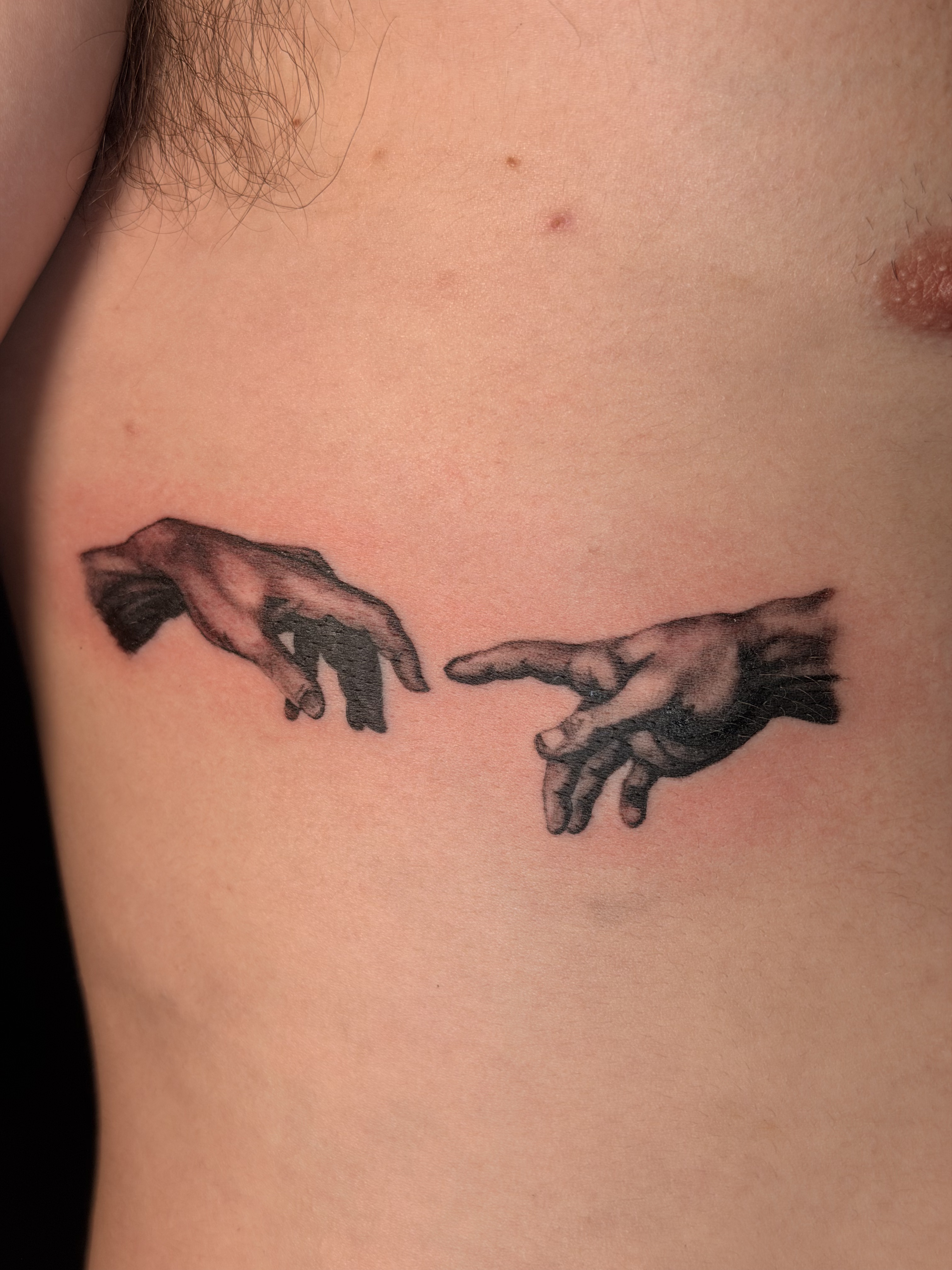 Fine line script rib tattoo