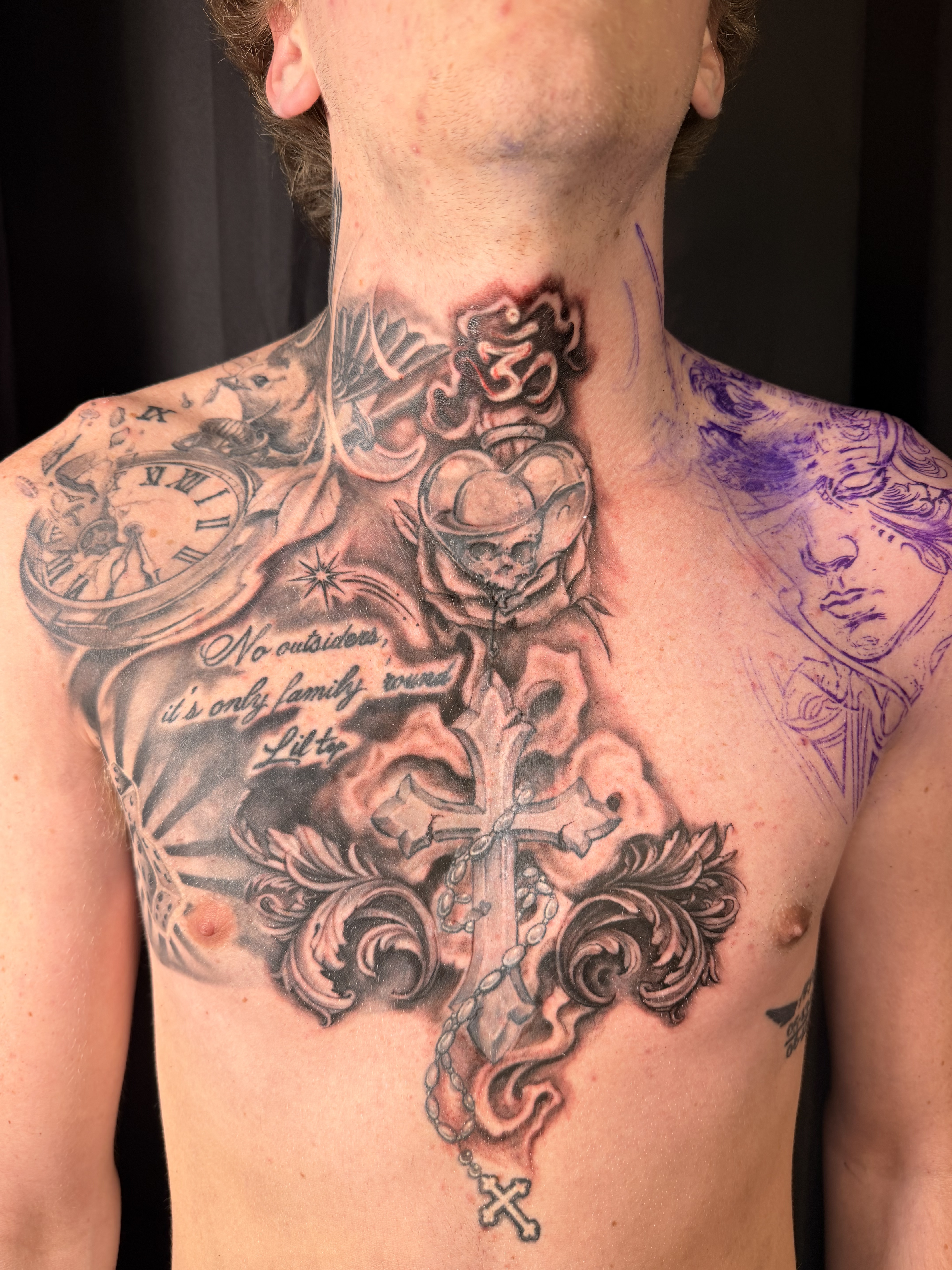 Black and grey forearm tattoo