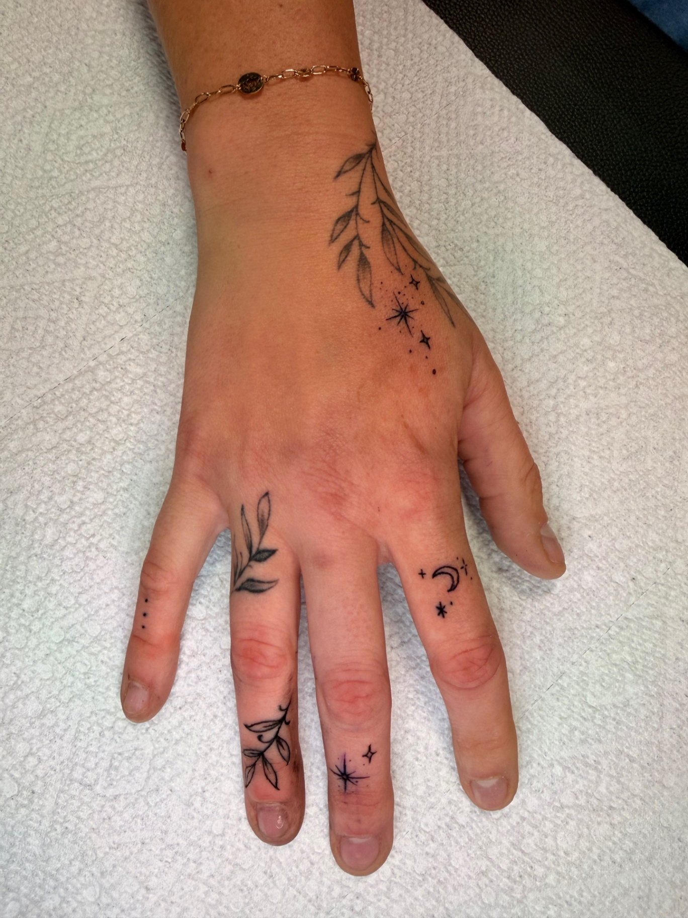 Fine line botanical and celestial hand tattoo set
