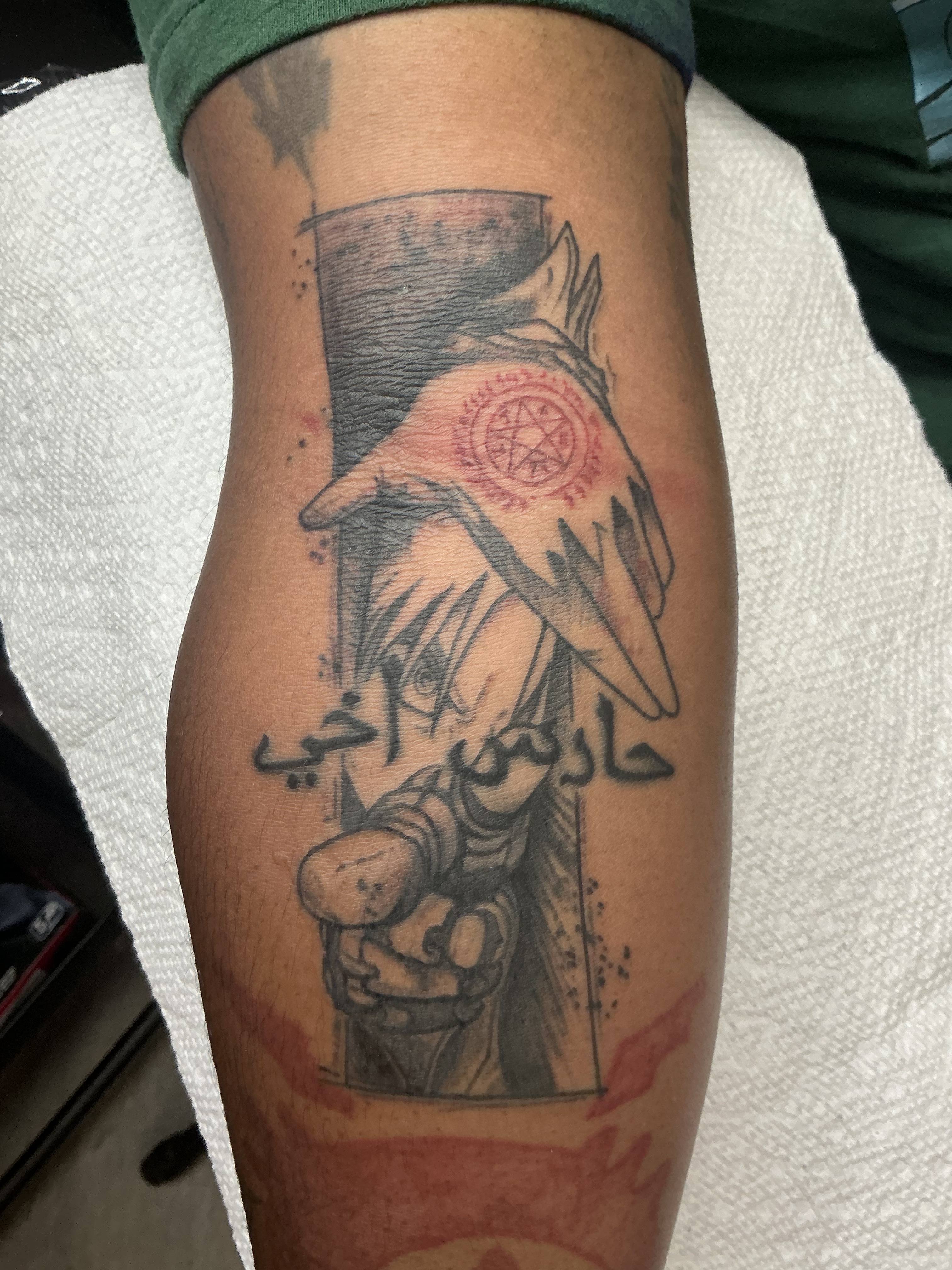 Fine line botanical tattoo