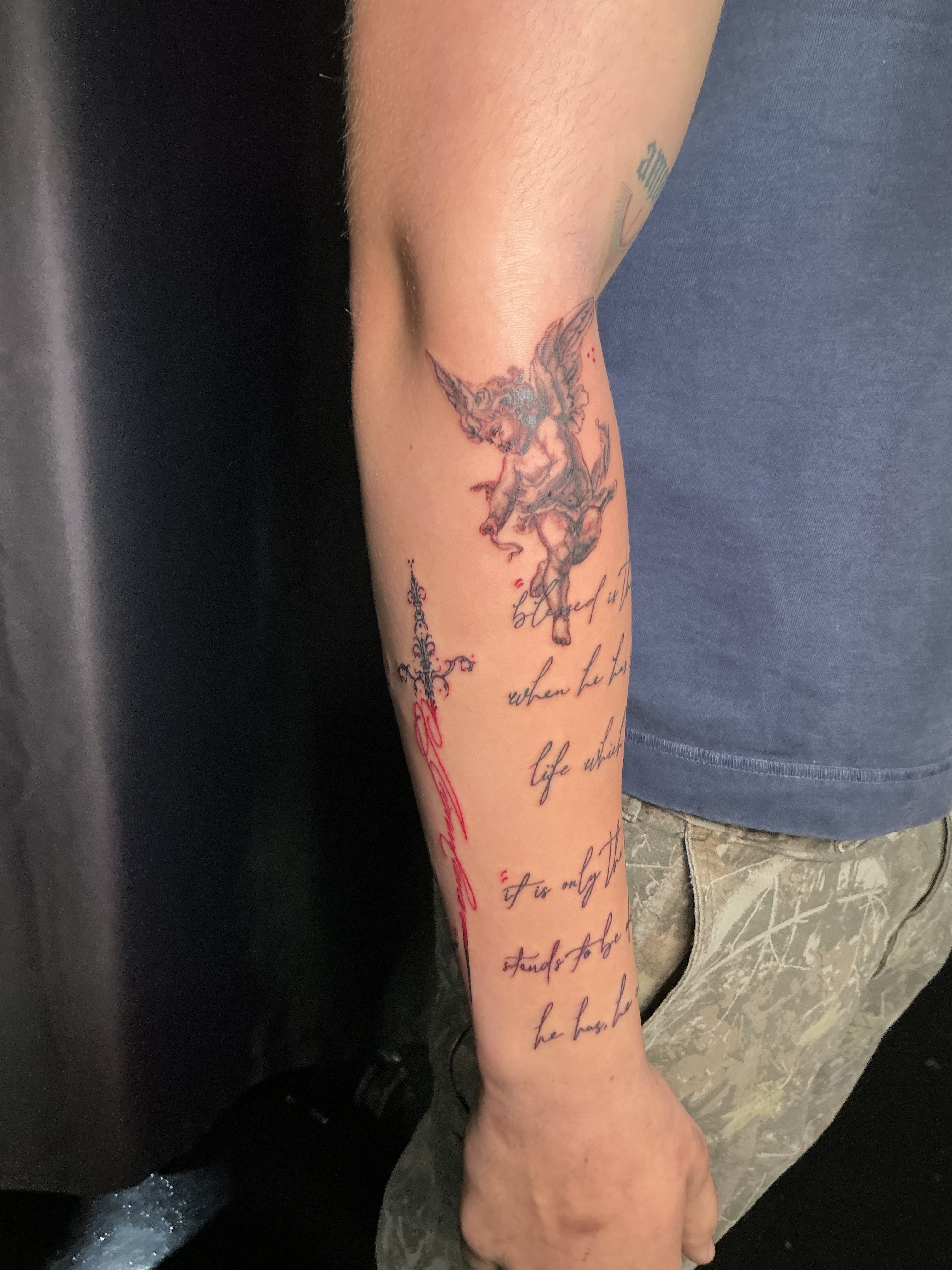 Fine line script forearm tattoo