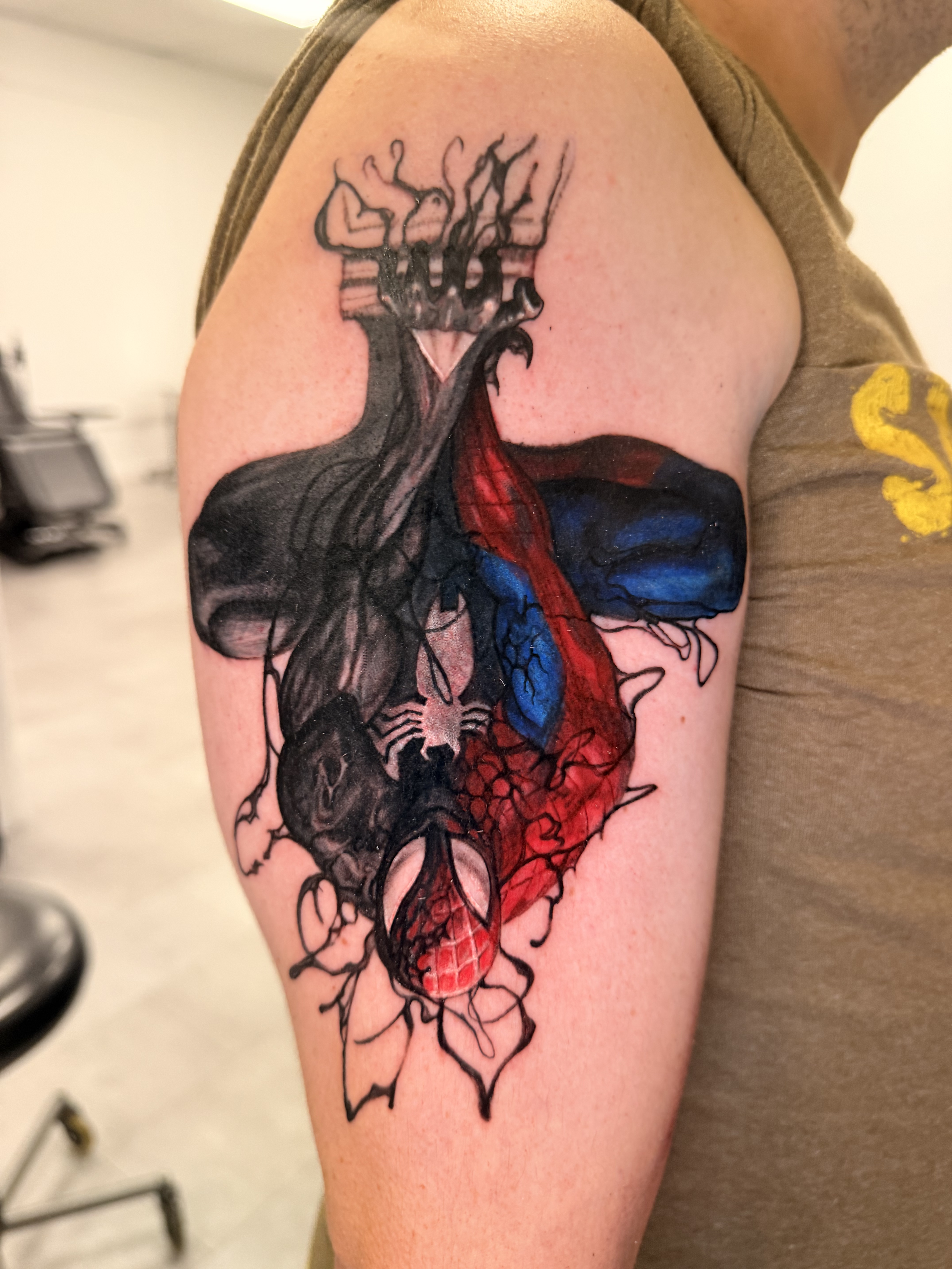 Large black and grey shoulder tattoo