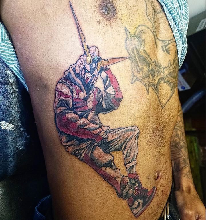 Color anime Gundam mecha tattoo on ribs