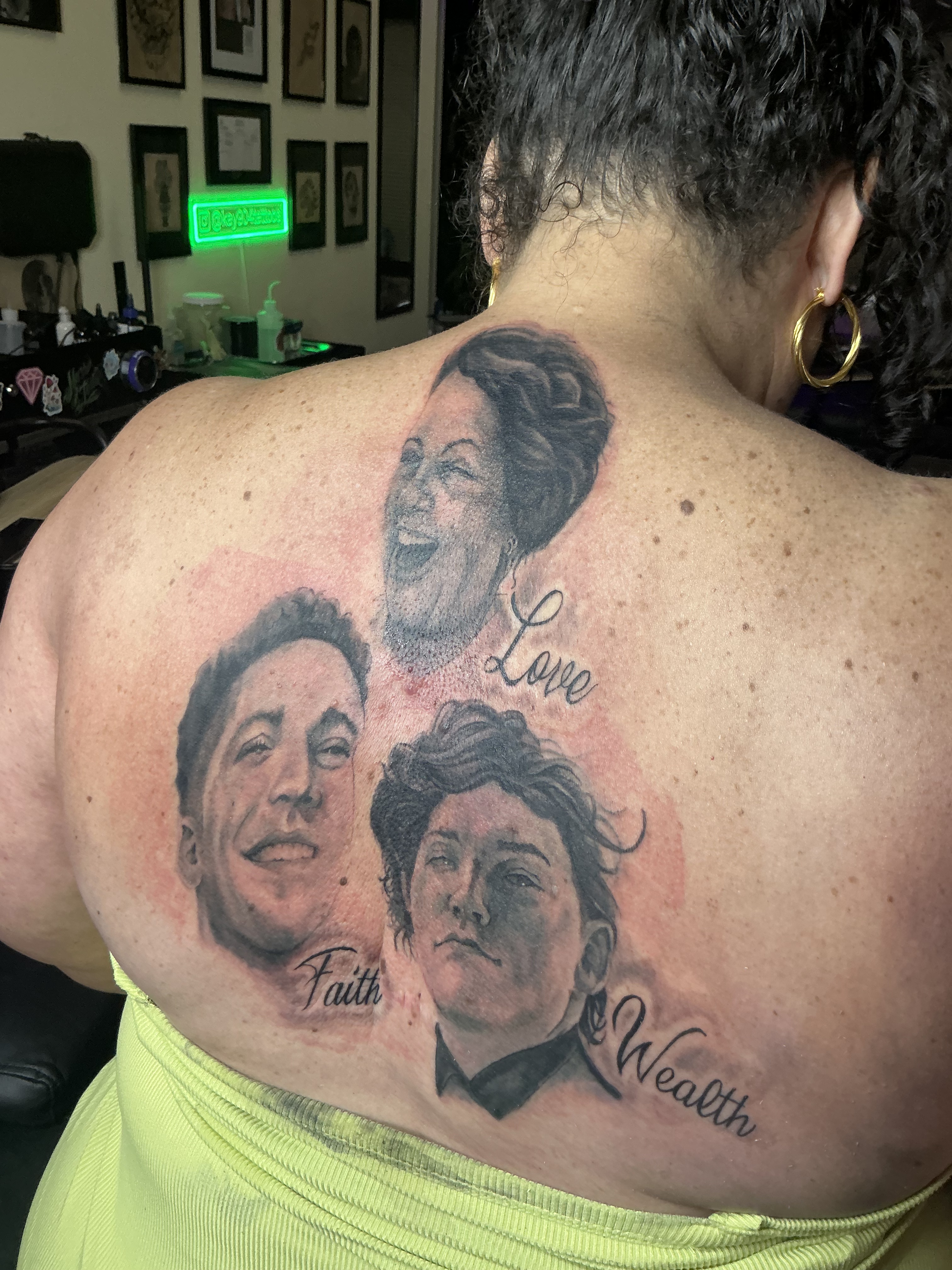 Portrait tattoo on the upper arm