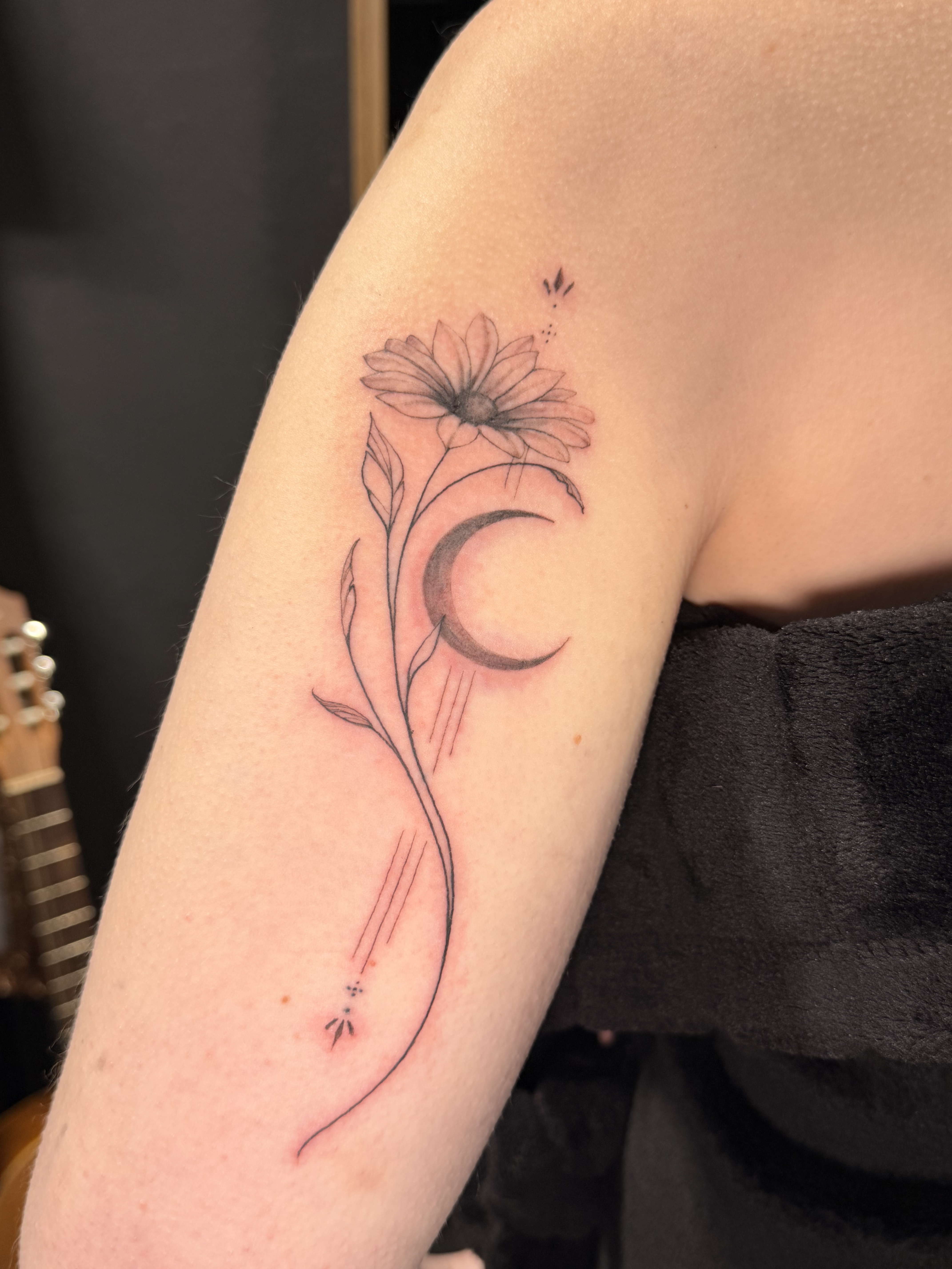 Fine line botanical tattoo