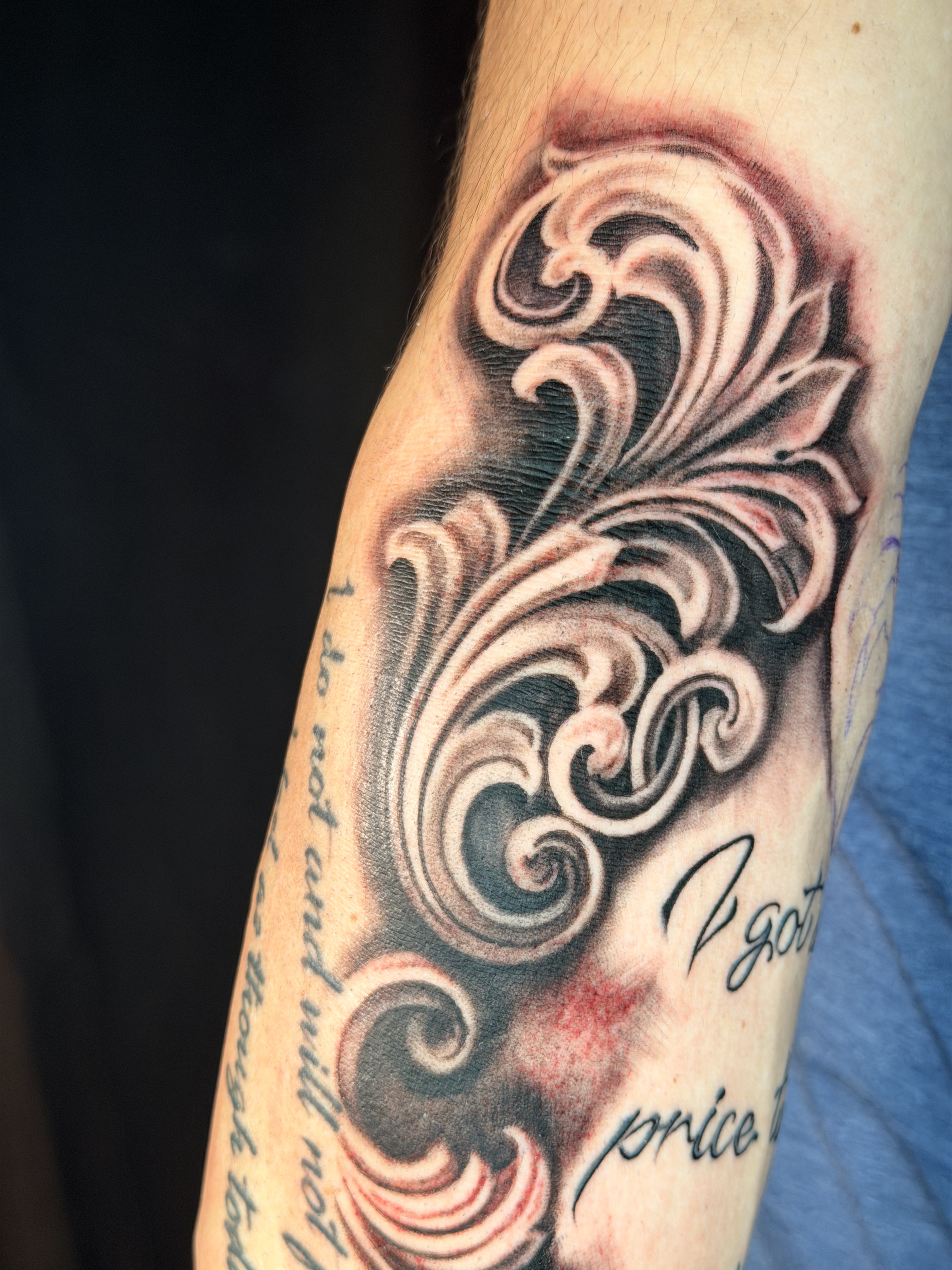 Fine line forearm tattoo