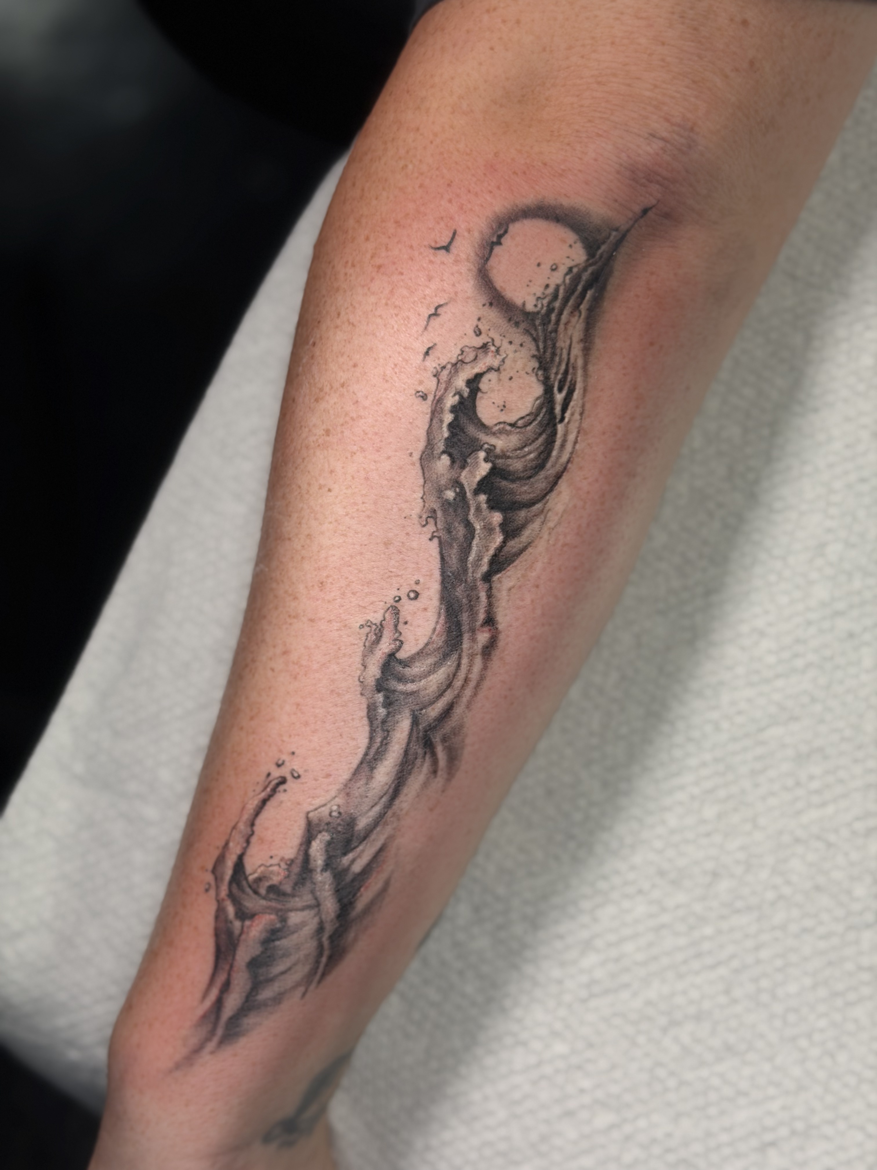 Black and grey neck tattoo