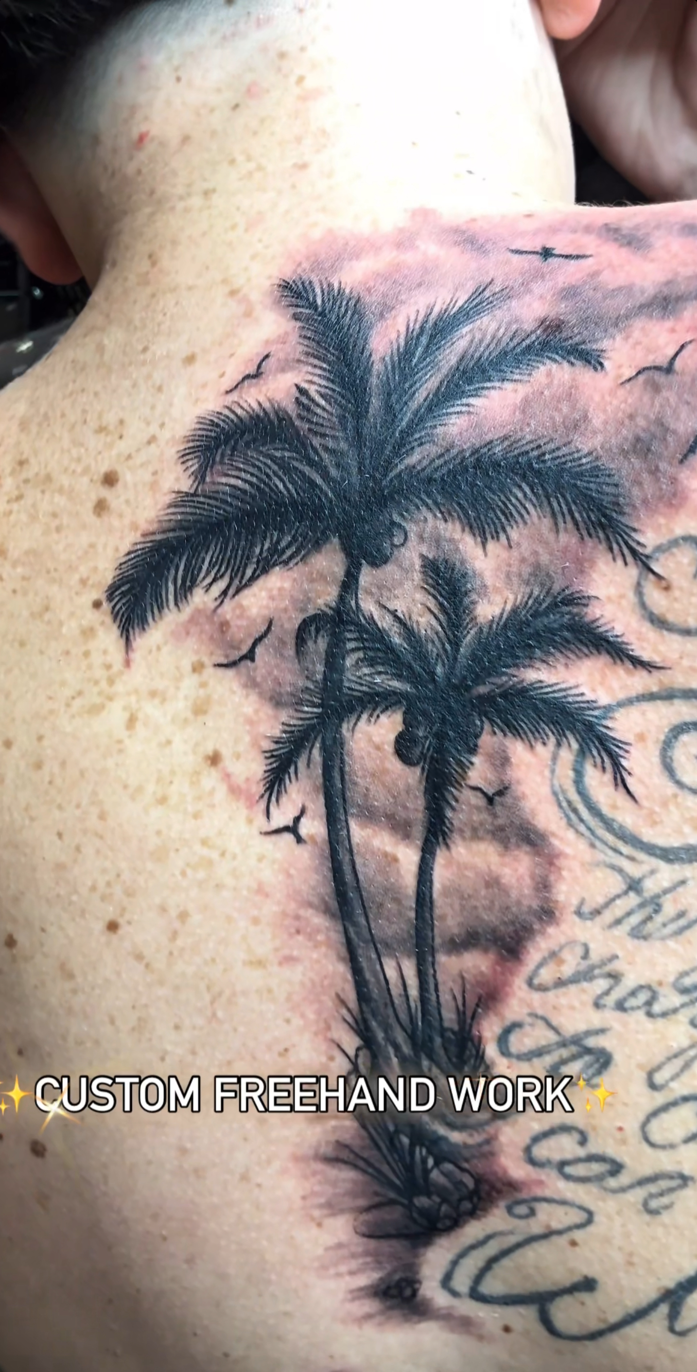 Black and grey illustrative forearm tattoo
