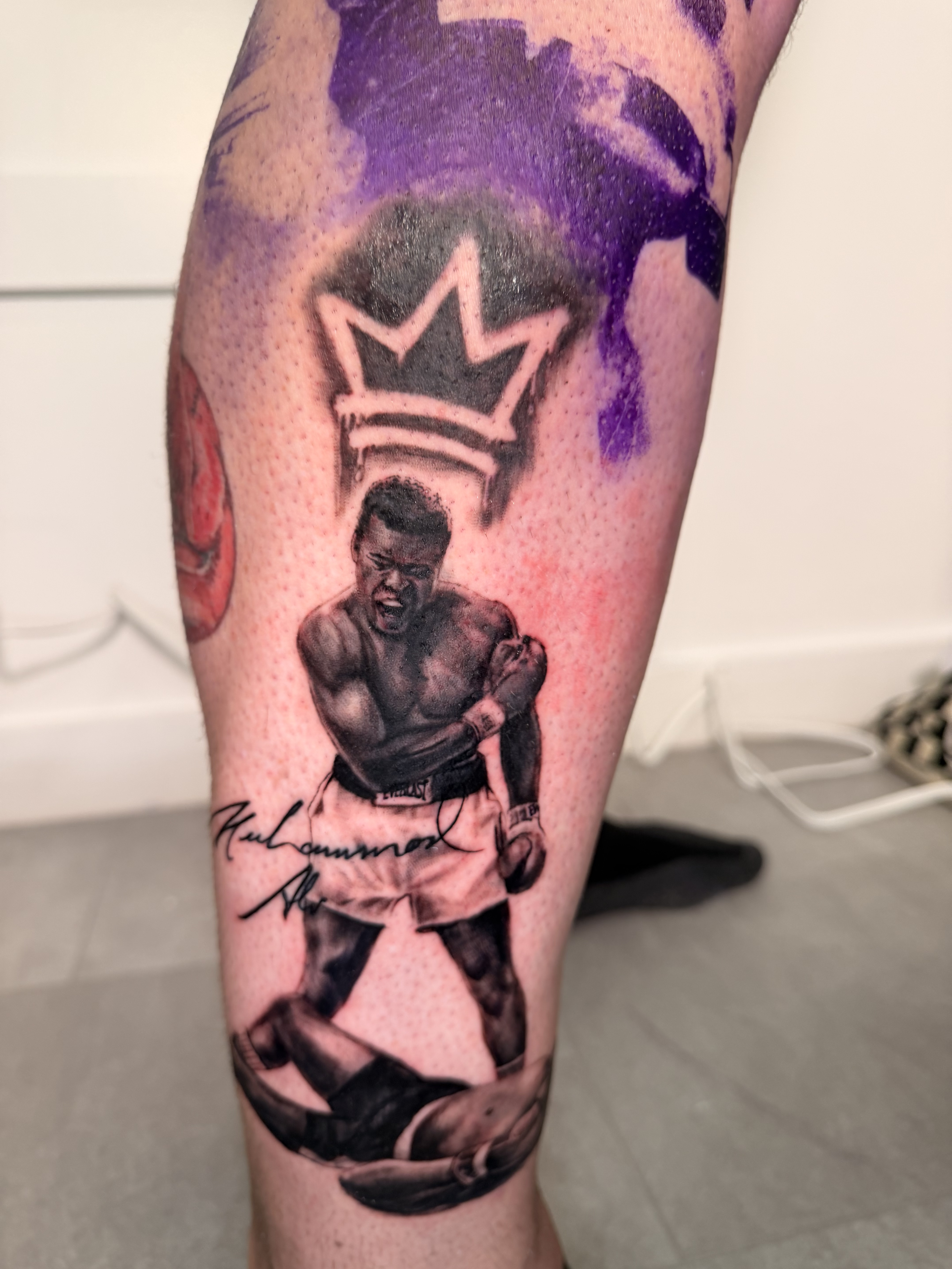 Large black and grey shoulder tattoo