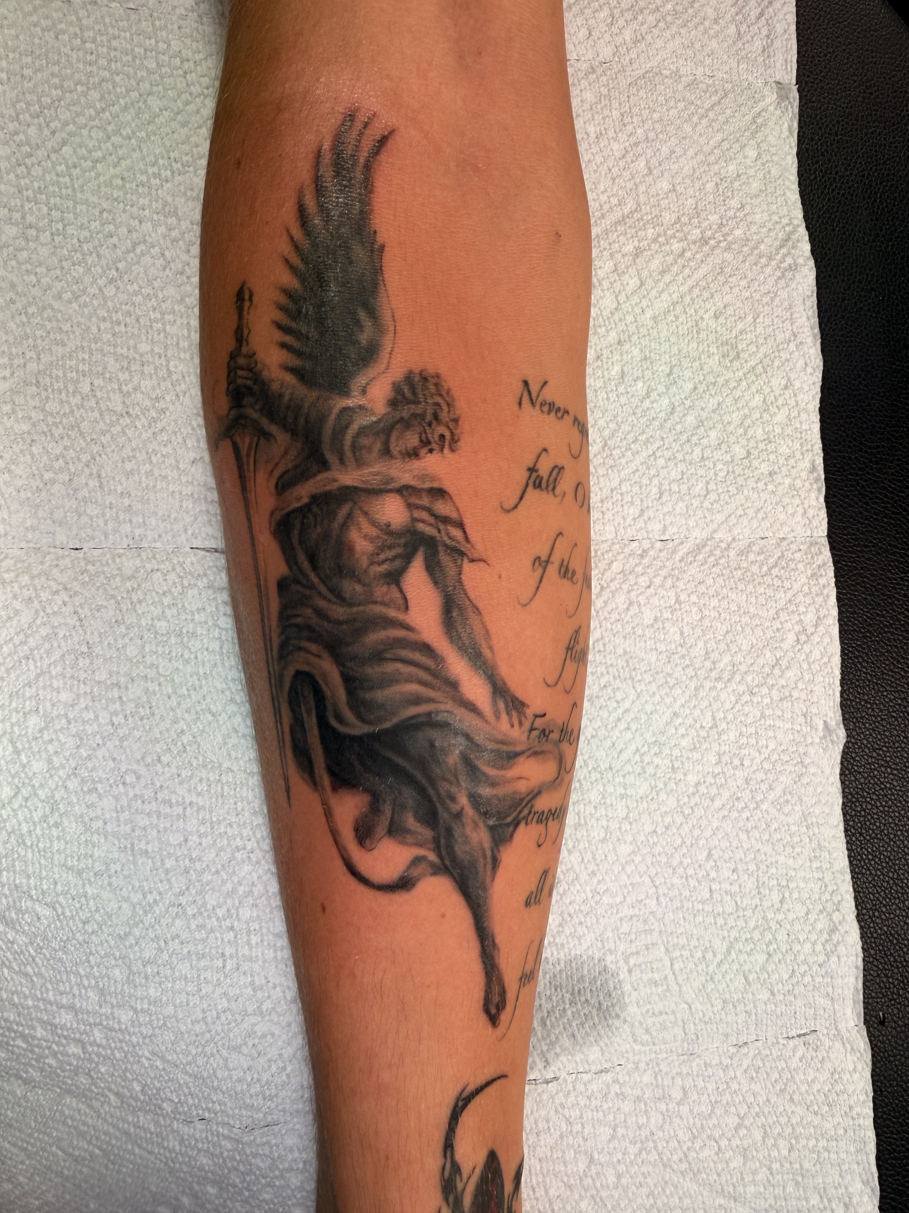 Large black and grey upper torso tattoo