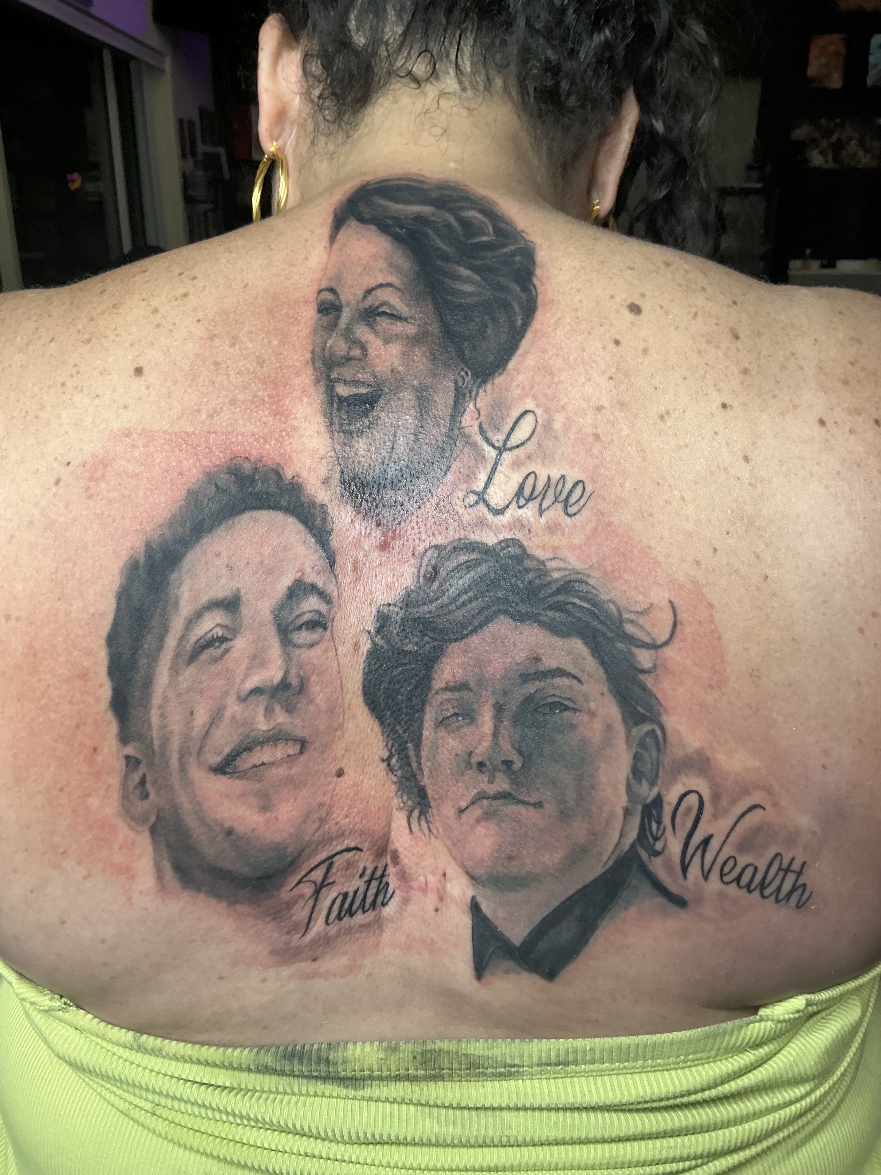 Large black and grey back tattoo