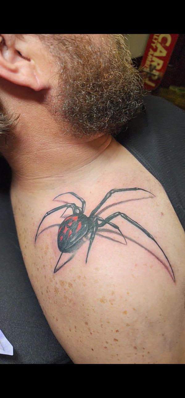 Black and grey illustrative forearm tattoo
