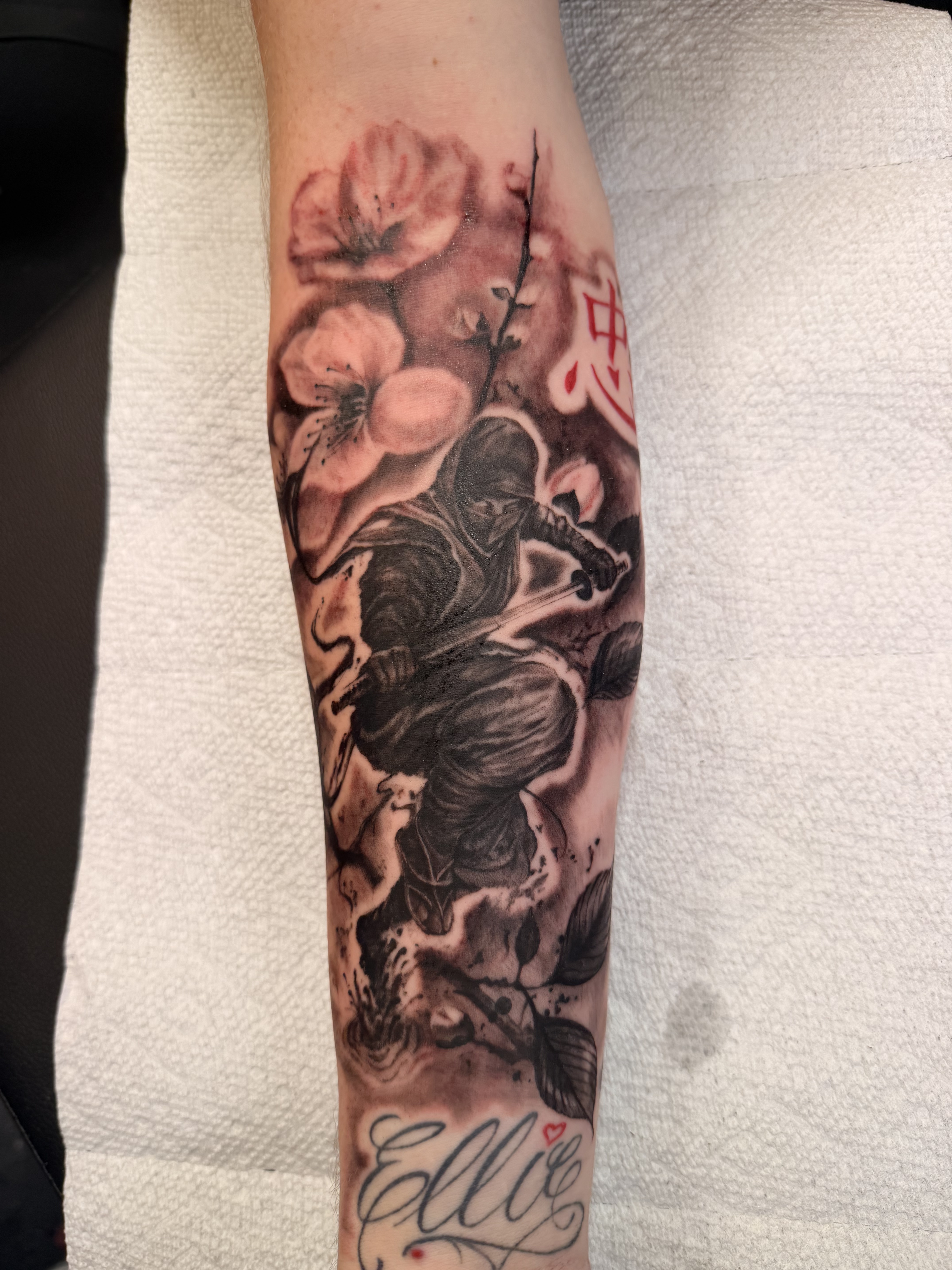 Fine line forearm tattoo